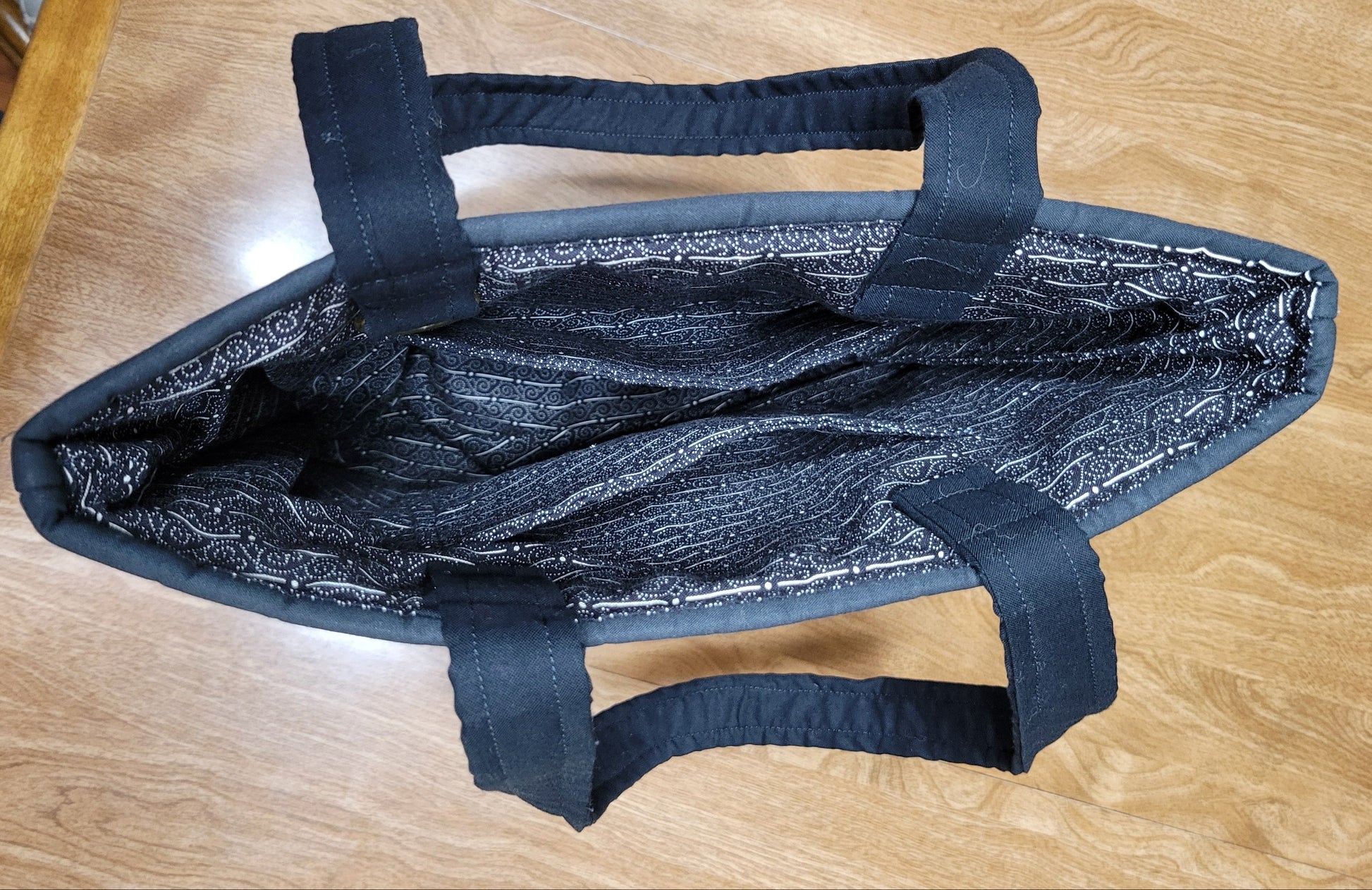 Blue insulated bag on a wooden surface